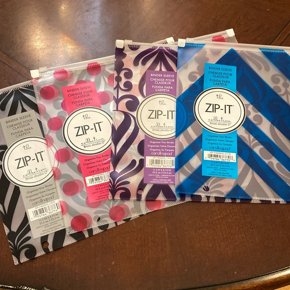 Studio C “The Zip-It Collection”, set of 4 zipper binder sleeves.